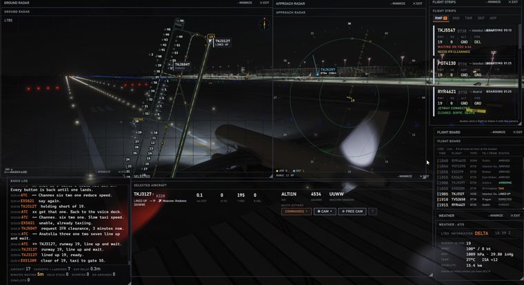 An aircraft lined up on the runway at night, holding for take off.