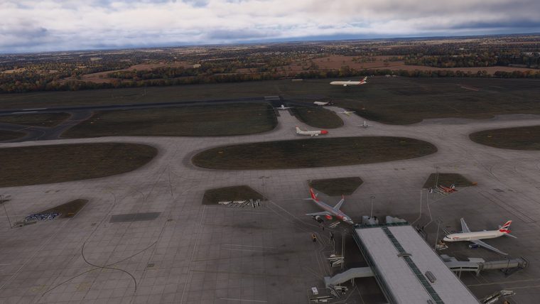 Stansted's apron from above, British Airways aircraft at a pier.