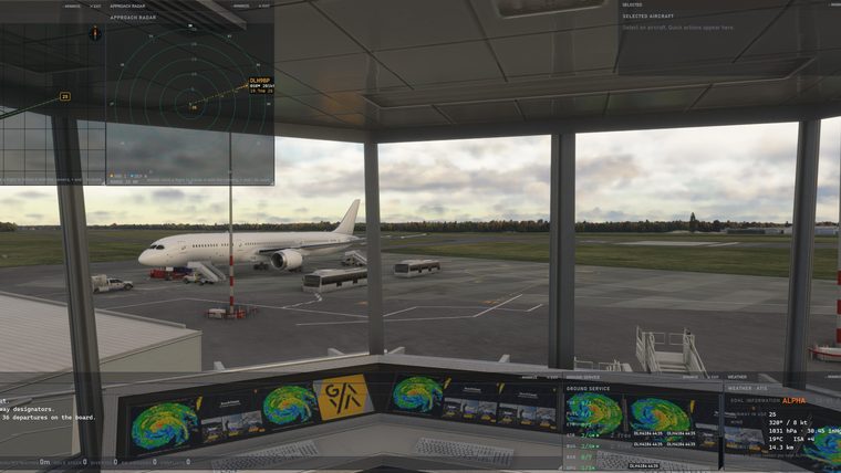 The view from the tower cab at Lübeck over a widebody on stand, with the Airside panels at the edges.